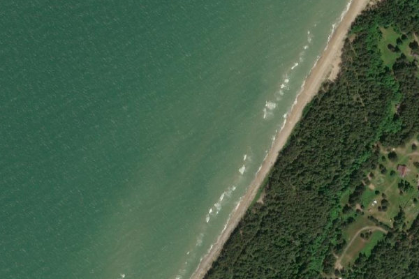 Satellite image of the area around Grāvīši · shore